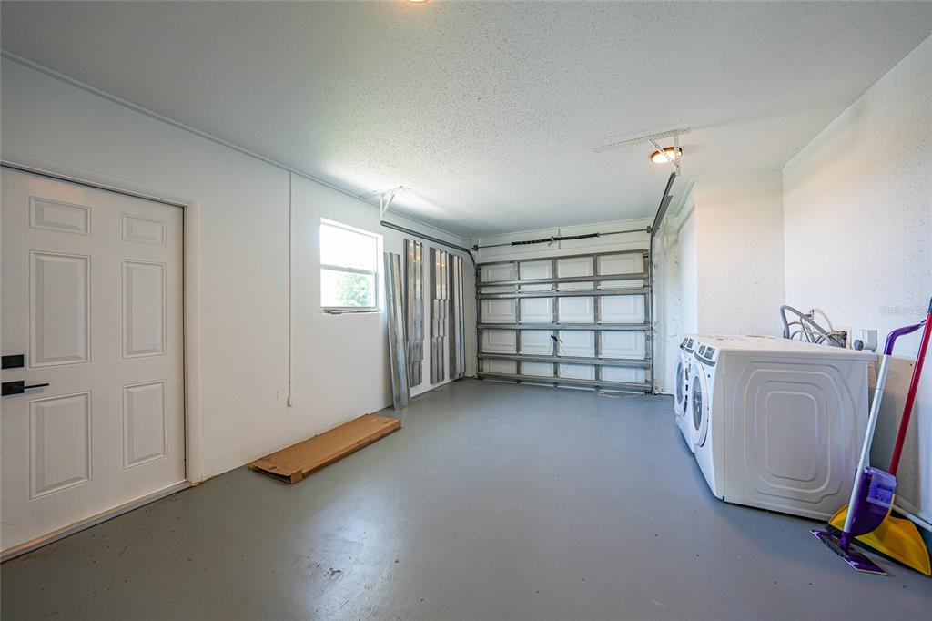 2166 Beacon Drive Port Charlotte, FL 33952 - Photo 24 of 36 a view of a room with windows and cabinet