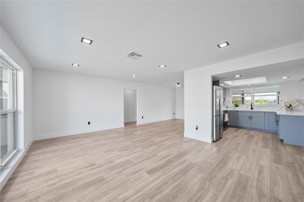 2166 Beacon Drive Port Charlotte, FL 33952 - Photo 8 of 36 a view of a kitchen with wooden floor