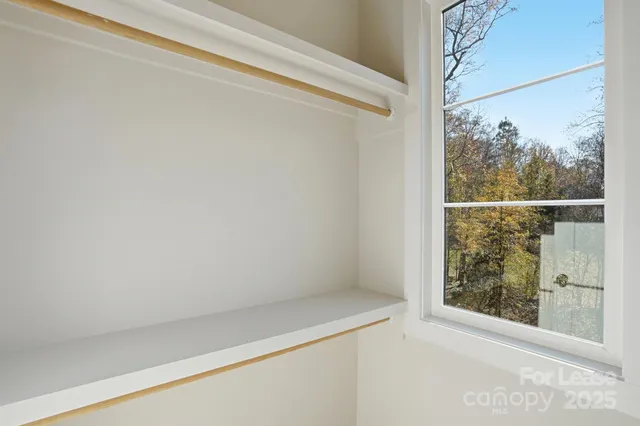 a view of a small space with a window