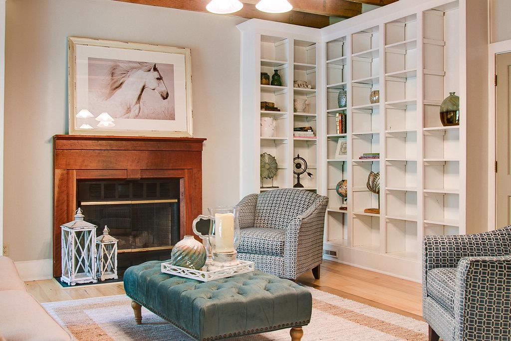 1143 Dora Whitley Road Franklin, TN 37064 - Photo 3 of 30 This room is the perfect place to display your prized possessions or favorite books, right next to the wood fireplace.