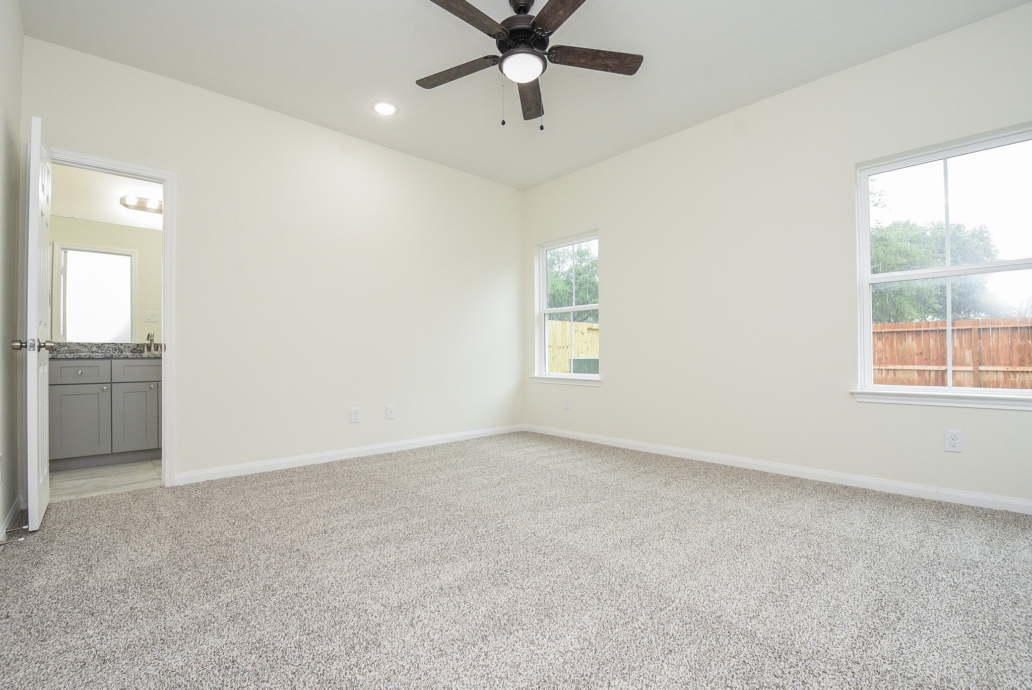 2807 Topiary Lane Houston, TX 77014 - Photo 21 of 32 a view of an empty room with a window