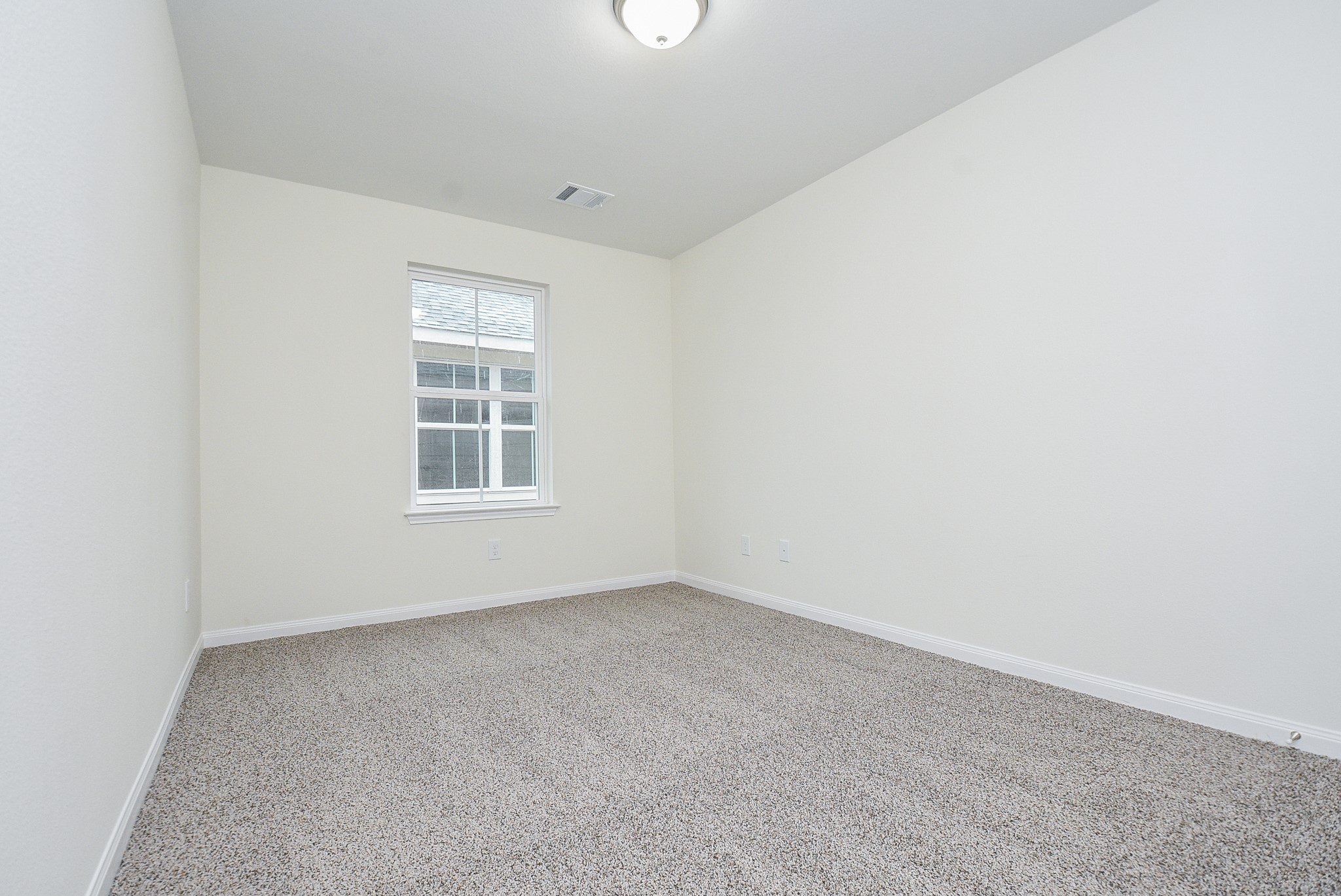 2807 Topiary Lane Houston, TX 77014 - Photo 25 of 32 an empty room with a window