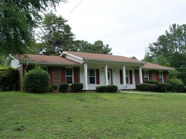 2875 Butner Road Atlanta, GA 30331 - Photo 1 of 1 a view of a house with garden and porch