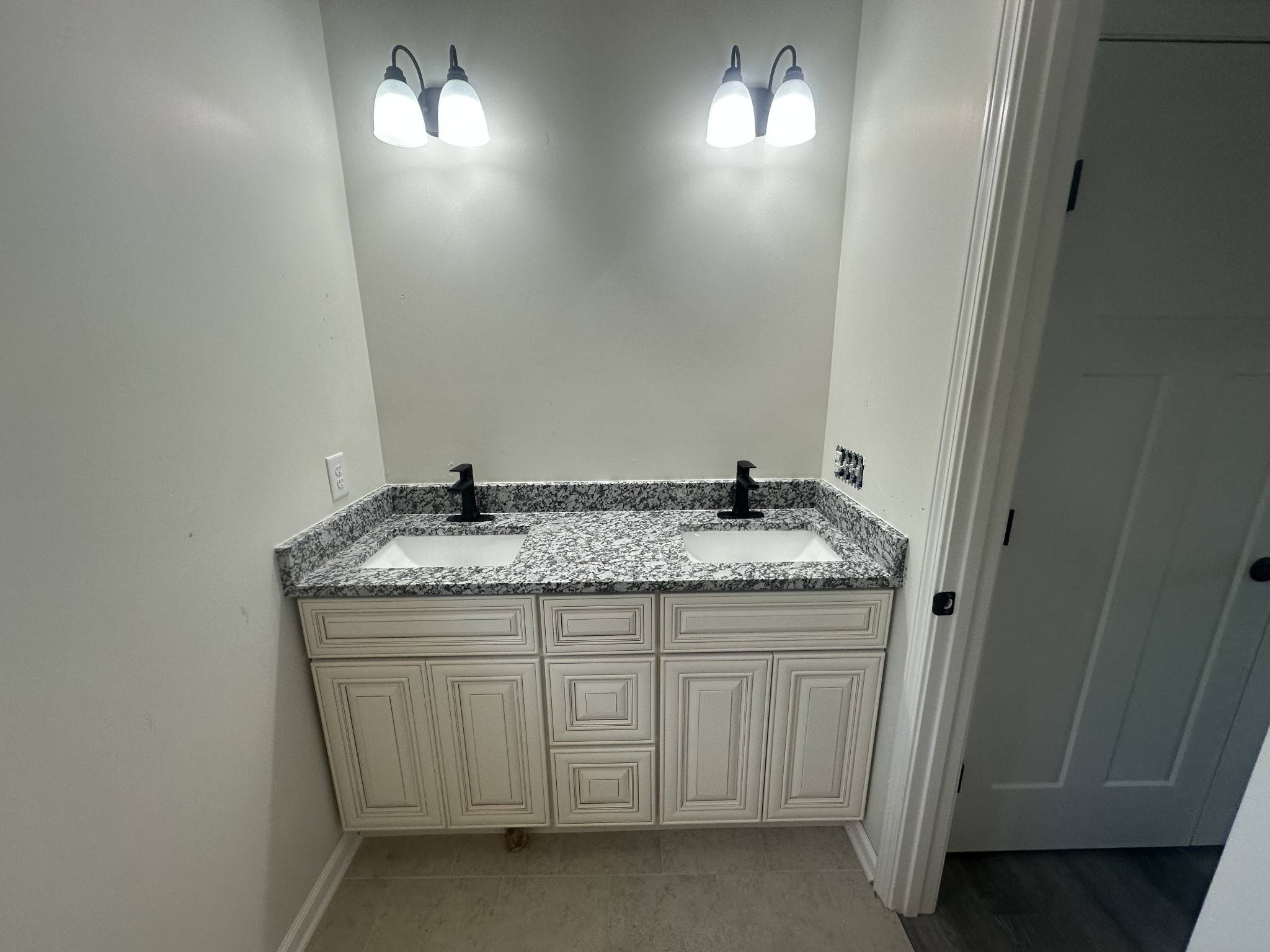 1615 Carthage Road Red Boiling Springs, TN 37150 - Photo 5 of 14 a bathroom with a granite countertop sink and a mirror