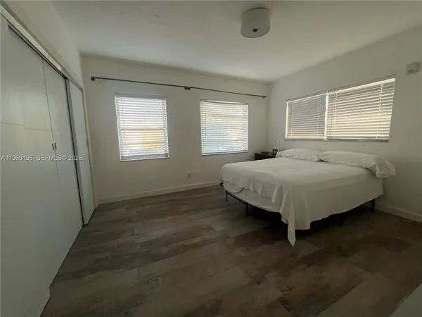 a bathroom with a sink and a window