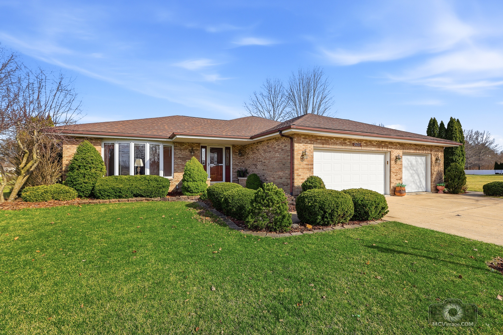 24711 South Sycamore Street Elwood, IL 60421 - Photo 1 of 38 a front view of a house with a yard