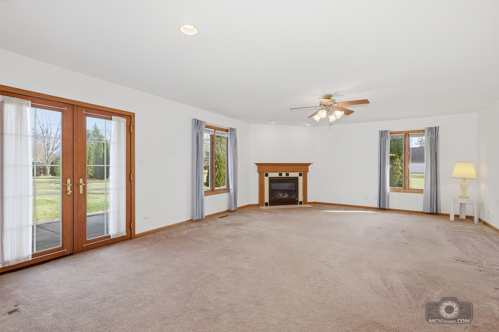 24711 South Sycamore Street Elwood, IL 60421 - Photo 12 of 38 an empty room with windows and fireplace