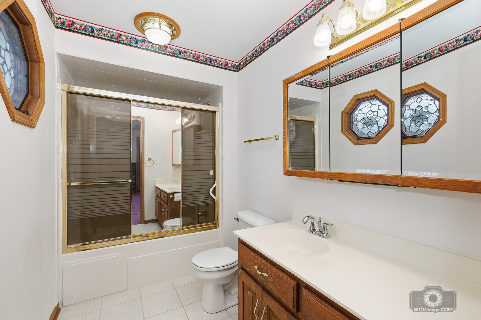 24711 South Sycamore Street Elwood, IL 60421 - Photo 20 of 38 a bathroom with a sink a toilet and a shower