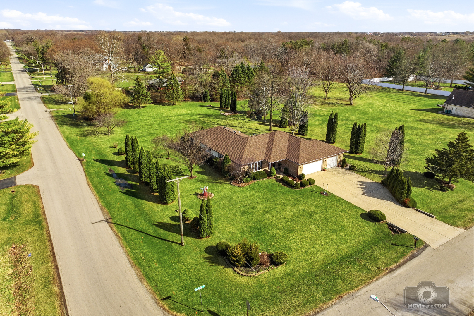 24711 South Sycamore Street Elwood, IL 60421 - Photo 2 of 38 an aerial view of a house with big yard