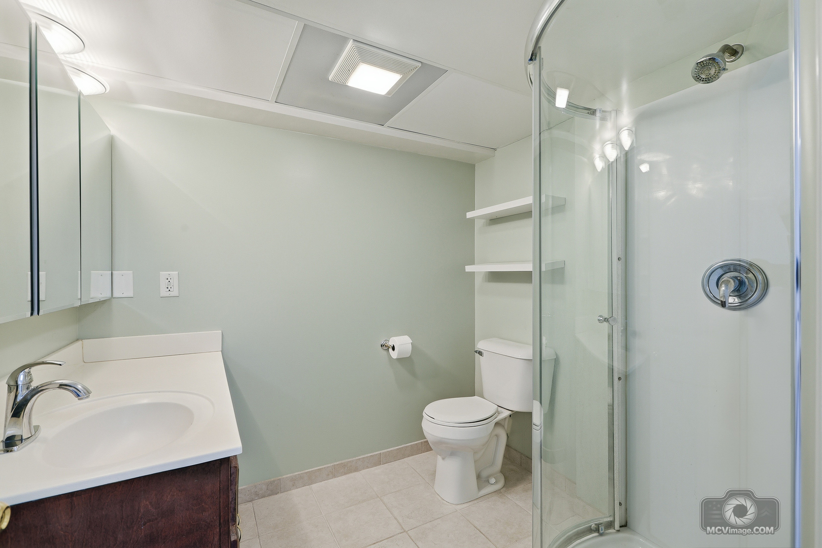 24711 South Sycamore Street Elwood, IL 60421 - Photo 23 of 38 a bathroom with a toilet sink and shower