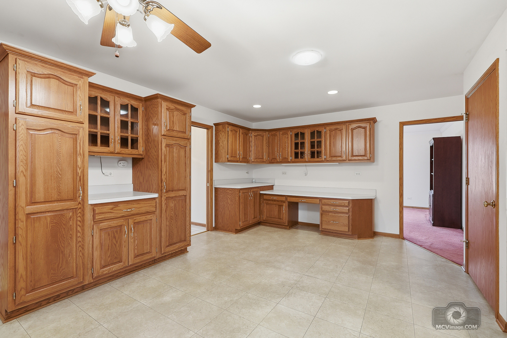 24711 South Sycamore Street Elwood, IL 60421 - Photo 9 of 38 a open kitchen with cabinets and wooden floor