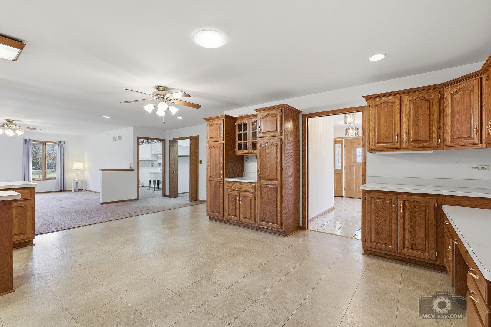 24711 South Sycamore Street Elwood, IL 60421 - Photo 10 of 38 a view of an empty room with window and kitchen view