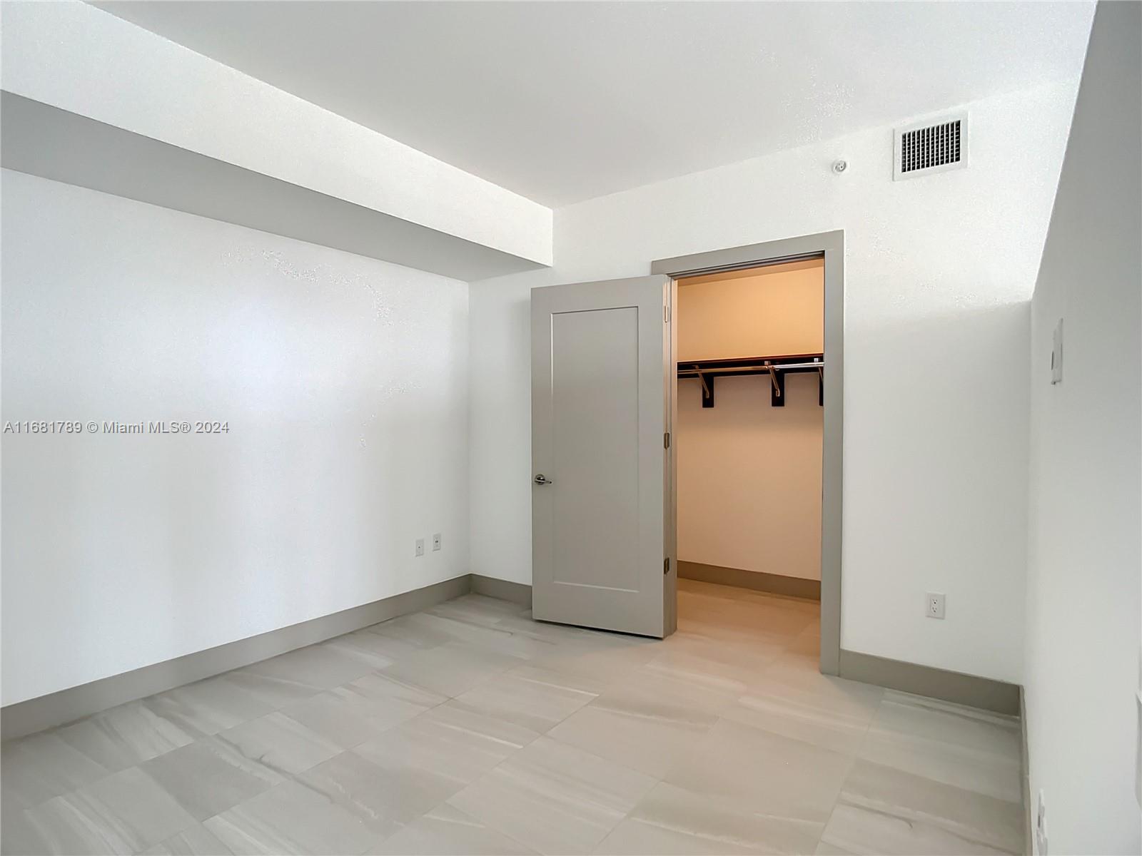 340 Southeast 3rd Street, Unit 1802 Miami, FL 33131 - Photo 17 of 36 a view of an empty room