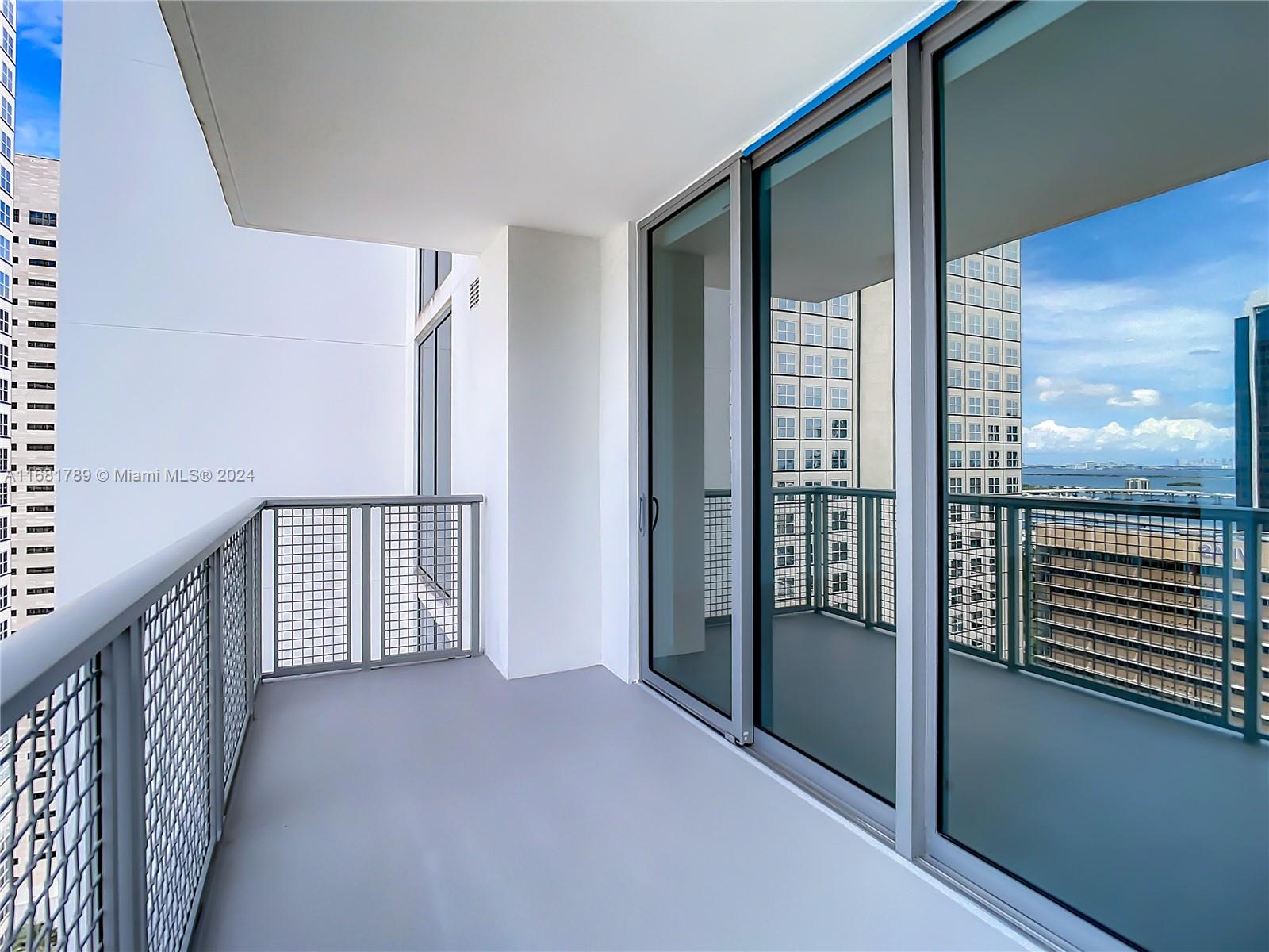 340 Southeast 3rd Street, Unit 1802 Miami, FL 33131 - Photo 32 of 36 a view of hallway with stairs
