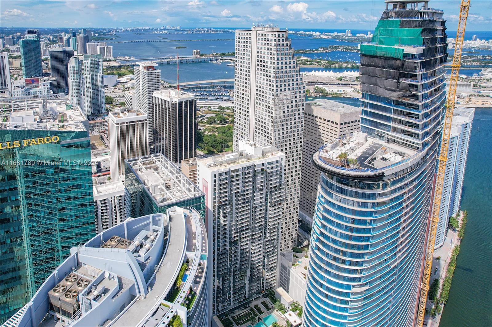 340 Southeast 3rd Street, Unit 1802 Miami, FL 33131 - Photo 35 of 36 a front view of a house with outdoor seating