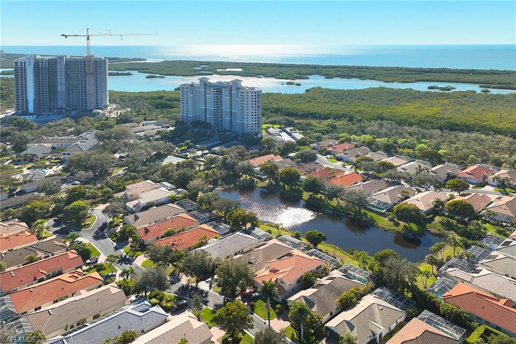 377 Mallory Court Naples, FL 34110 - Photo 26 of 29 an aerial view of residential houses with outdoor space