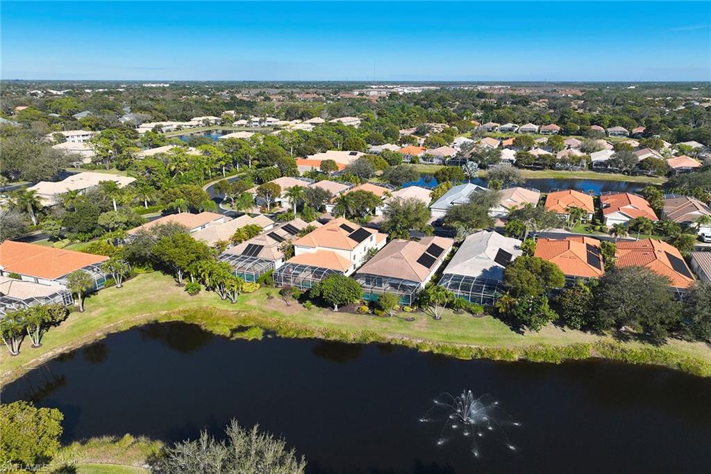 377 Mallory Court Naples, FL 34110 - Photo 28 of 29 an aerial view of residential houses with outdoor space