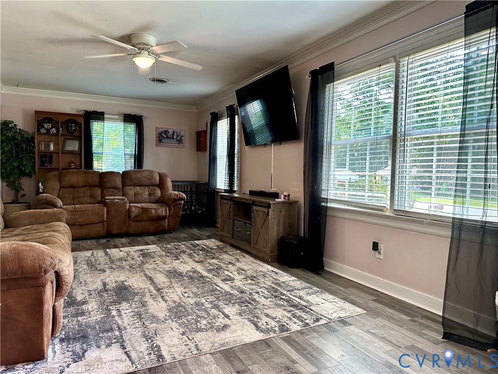 7817 Woodbrook Road Quinton, VA 23141 - Photo 5 of 28 Spacious living area featuring wood-finish floorin