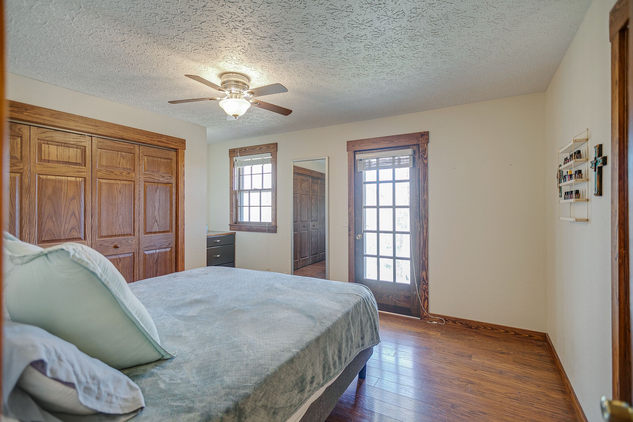 10997 Rials Branch Road Bon Aqua, TN 37025 - Photo 14 of 39 a bedroom with a bed and a window