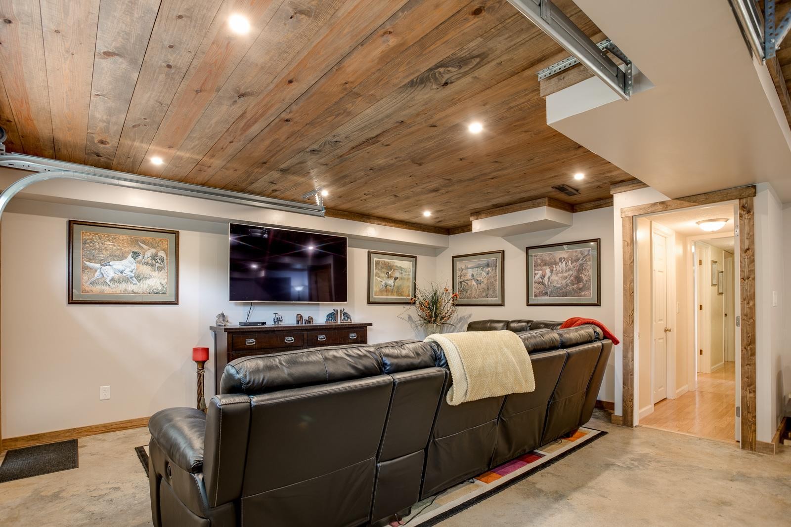 10997 Rials Branch Road Bon Aqua, TN 37025 - Photo 21 of 39 a living room with furniture and a flat screen tv