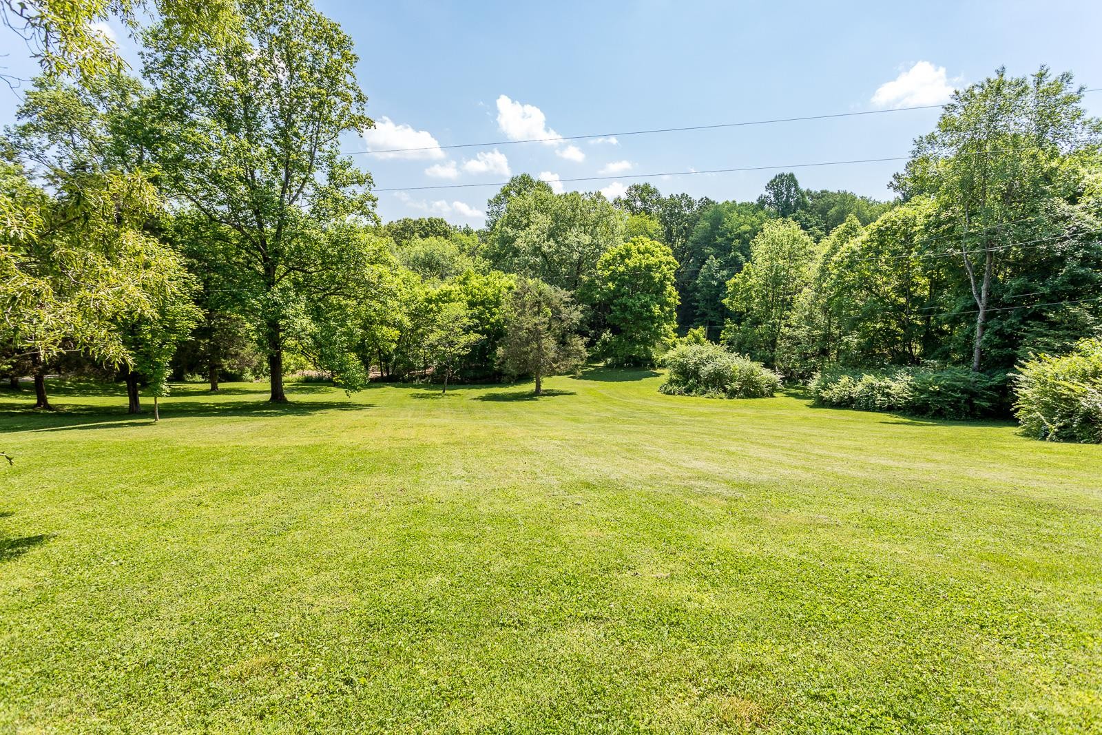 10997 Rials Branch Road Bon Aqua, TN 37025 - Photo 30 of 39 a view of swimming pool with an outdoor space and seating area