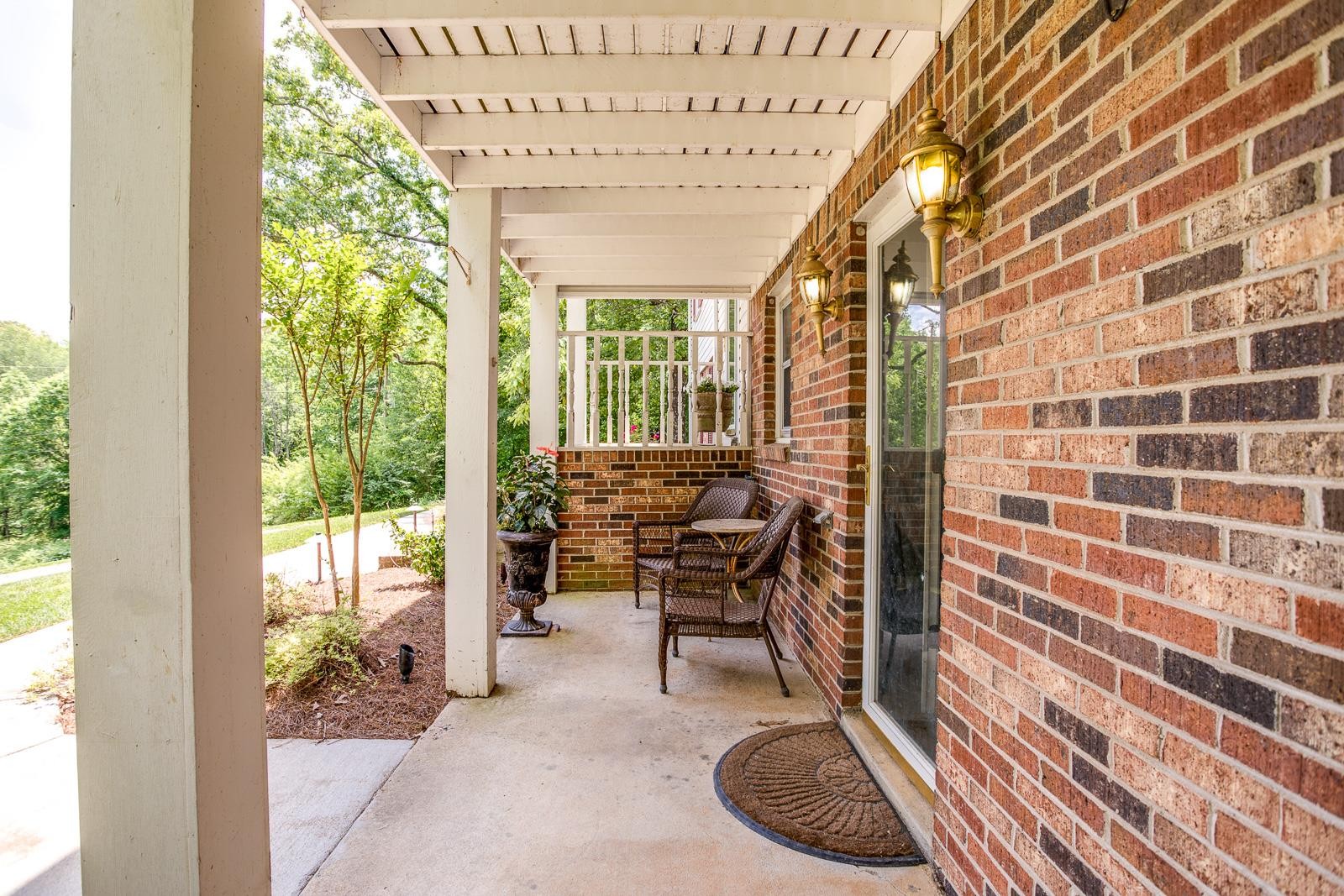 10997 Rials Branch Road Bon Aqua, TN 37025 - Photo 5 of 39 a work room with furniture and a floor to ceiling window