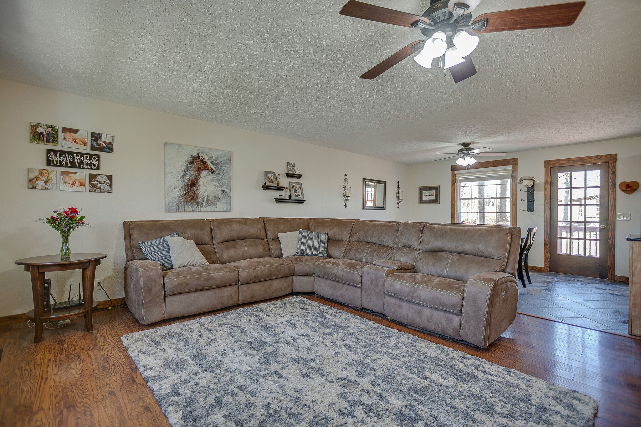 10997 Rials Branch Road Bon Aqua, TN 37025 - Photo 9 of 39 a living room with furniture and wooden floor