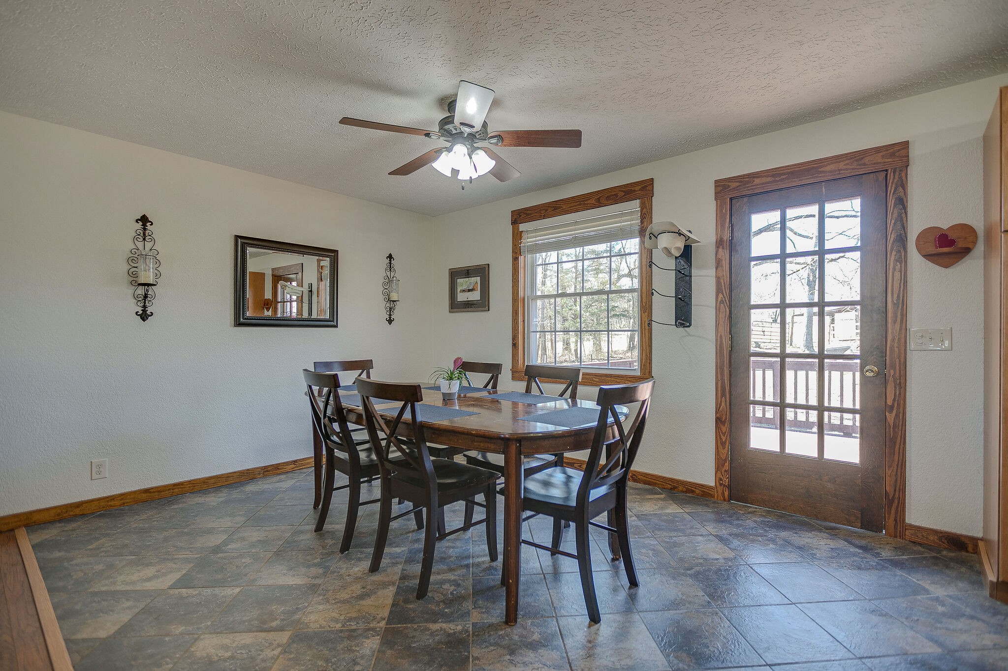 10997 Rials Branch Road Bon Aqua, TN 37025 - Photo 10 of 39 a view of a dining room with furniture and window