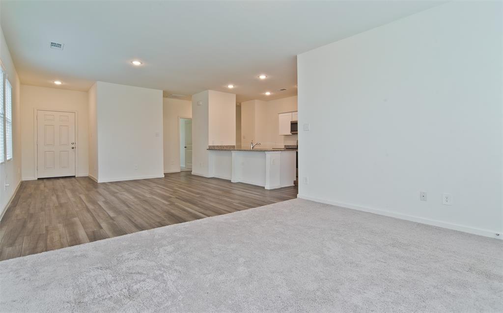 1637 Shadow Hawk Drive Fort Worth, TX 76052 - Photo 4 of 20 a view of kitchen and wooden floor