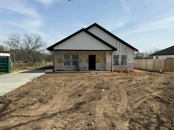 a front view of house with a yard