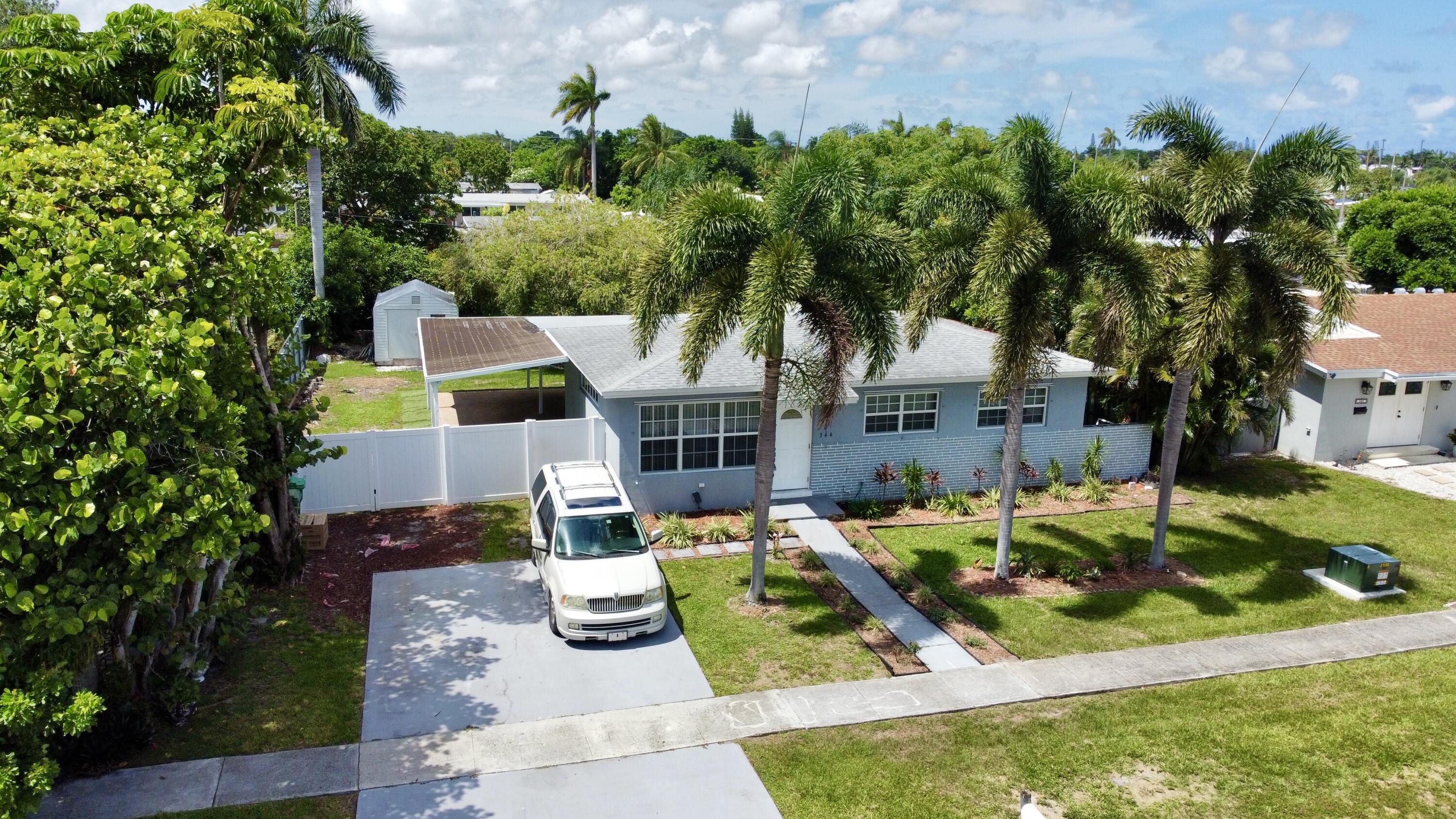 344 Shady Lane Road Palm Springs, FL 33461 - Photo 1 of 16 dji_fly_20240621_150452_416_171899670464