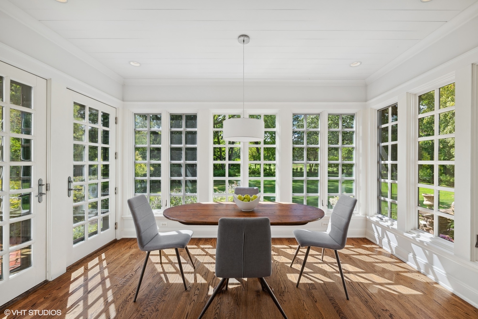 36 Indian Hill Road Winnetka, IL 60093 - Photo 11 of 51 a view of a dining room with furniture window and outside view