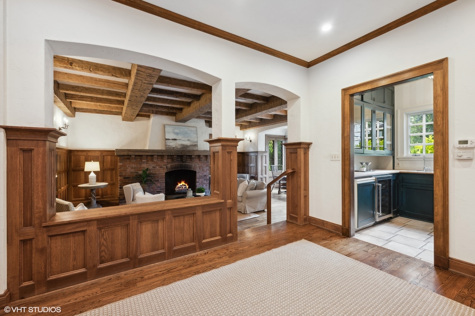 36 Indian Hill Road Winnetka, IL 60093 - Photo 13 of 51 a living room with furniture and a fireplace