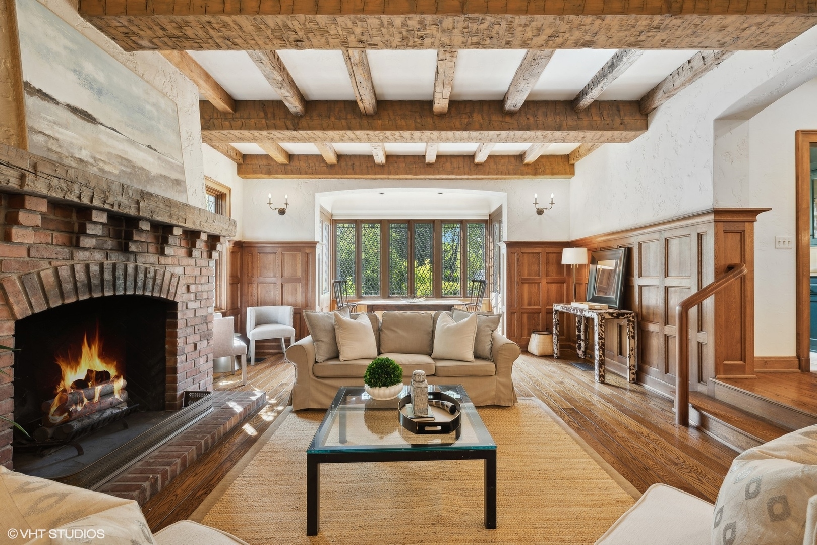 36 Indian Hill Road Winnetka, IL 60093 - Photo 15 of 51 a living room with furniture and a fireplace