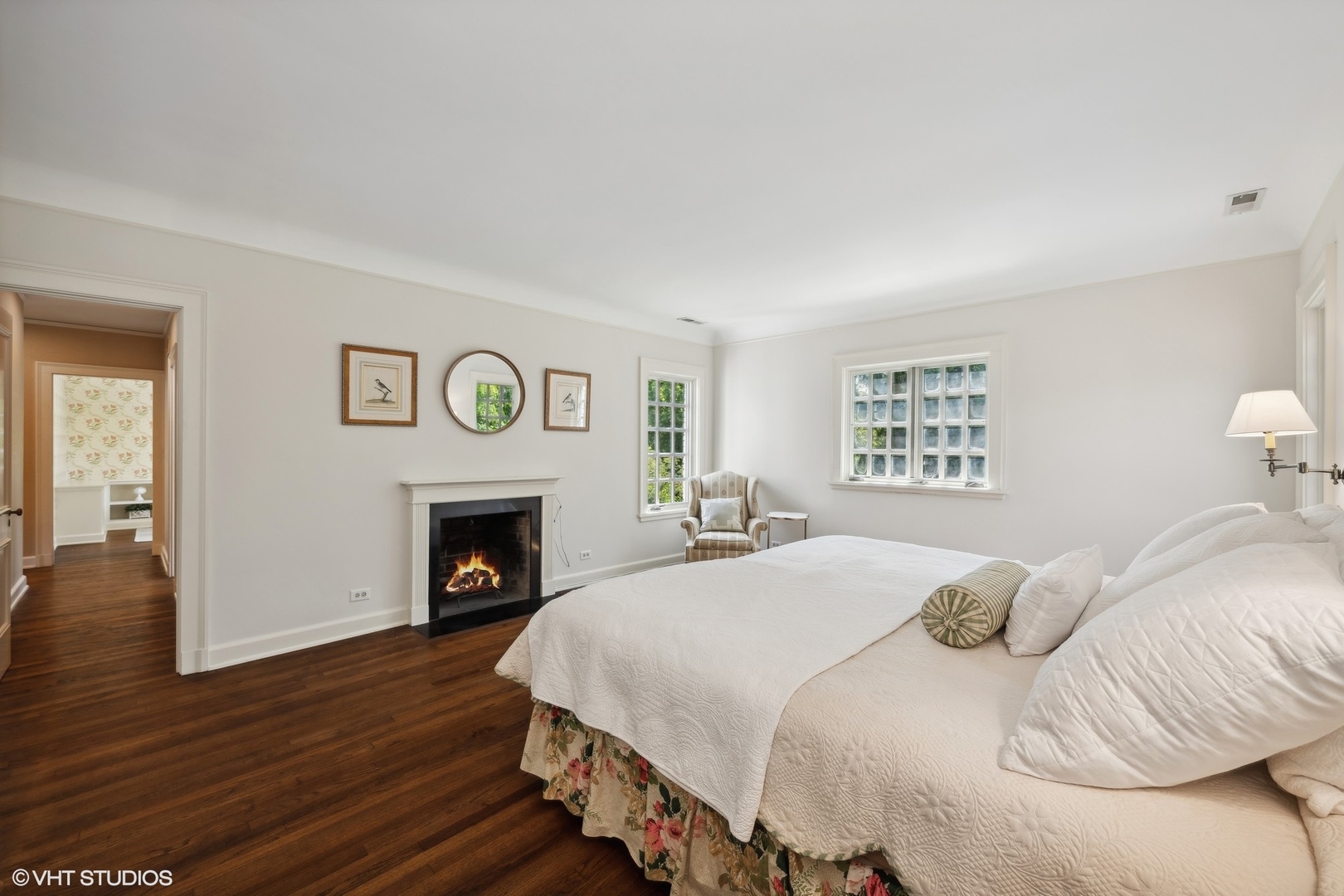 36 Indian Hill Road Winnetka, IL 60093 - Photo 21 of 51 a bedroom with a bed and a fireplace