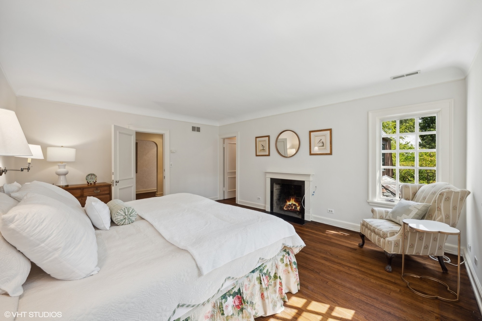 36 Indian Hill Road Winnetka, IL 60093 - Photo 22 of 51 a spacious bedroom with a bed and a fireplace