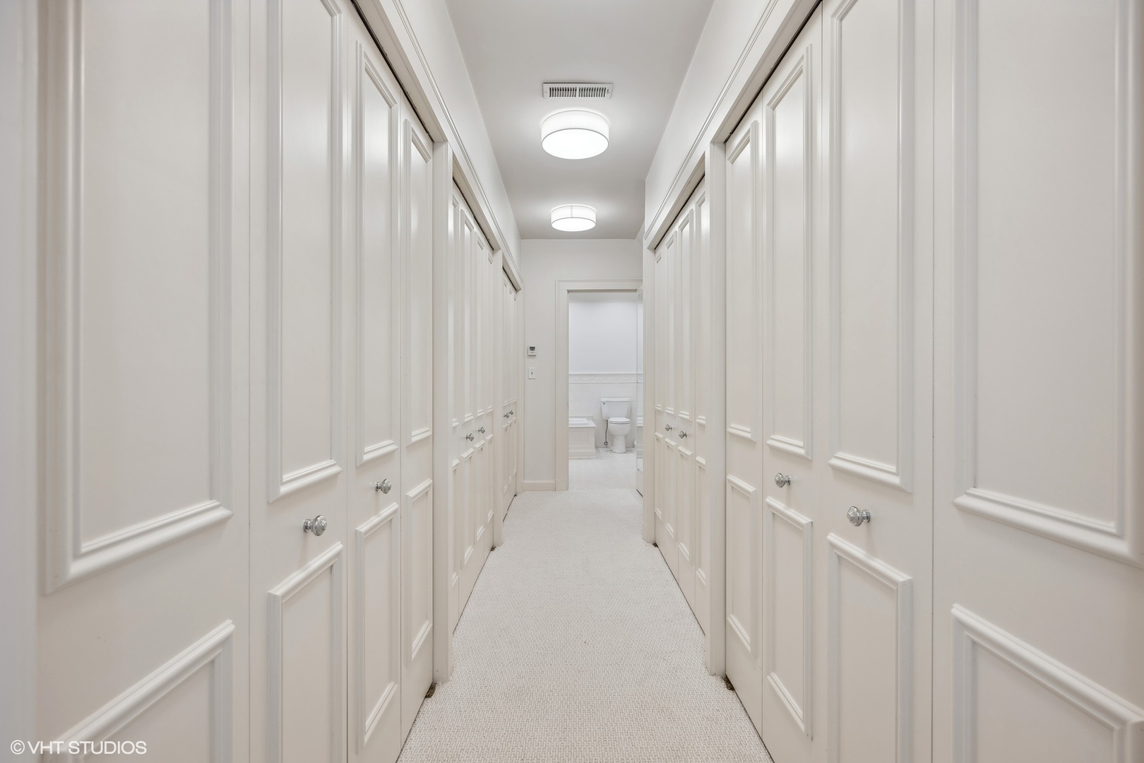 36 Indian Hill Road Winnetka, IL 60093 - Photo 30 of 51 a view of a hallway with white walls and stairs