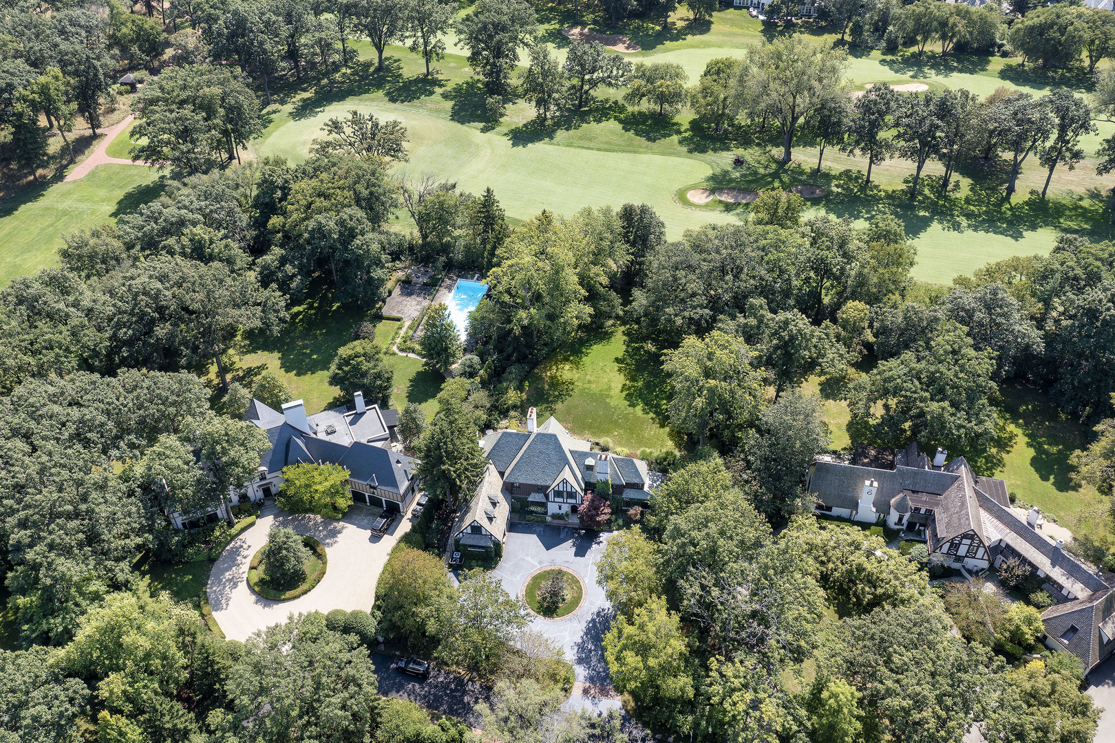 36 Indian Hill Road Winnetka, IL 60093 - Photo 3 of 51 an aerial view of residential house with outdoor space and swimming pool