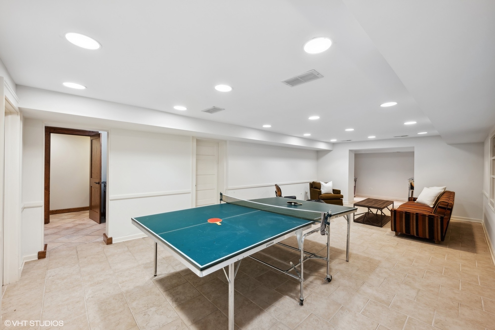 36 Indian Hill Road Winnetka, IL 60093 - Photo 37 of 51 a room with wooden floor pool table and furniture