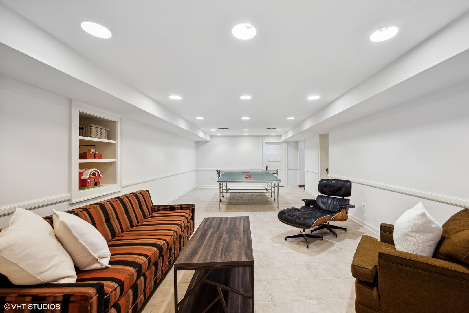 36 Indian Hill Road Winnetka, IL 60093 - Photo 38 of 51 a living room with furniture and a flat screen tv