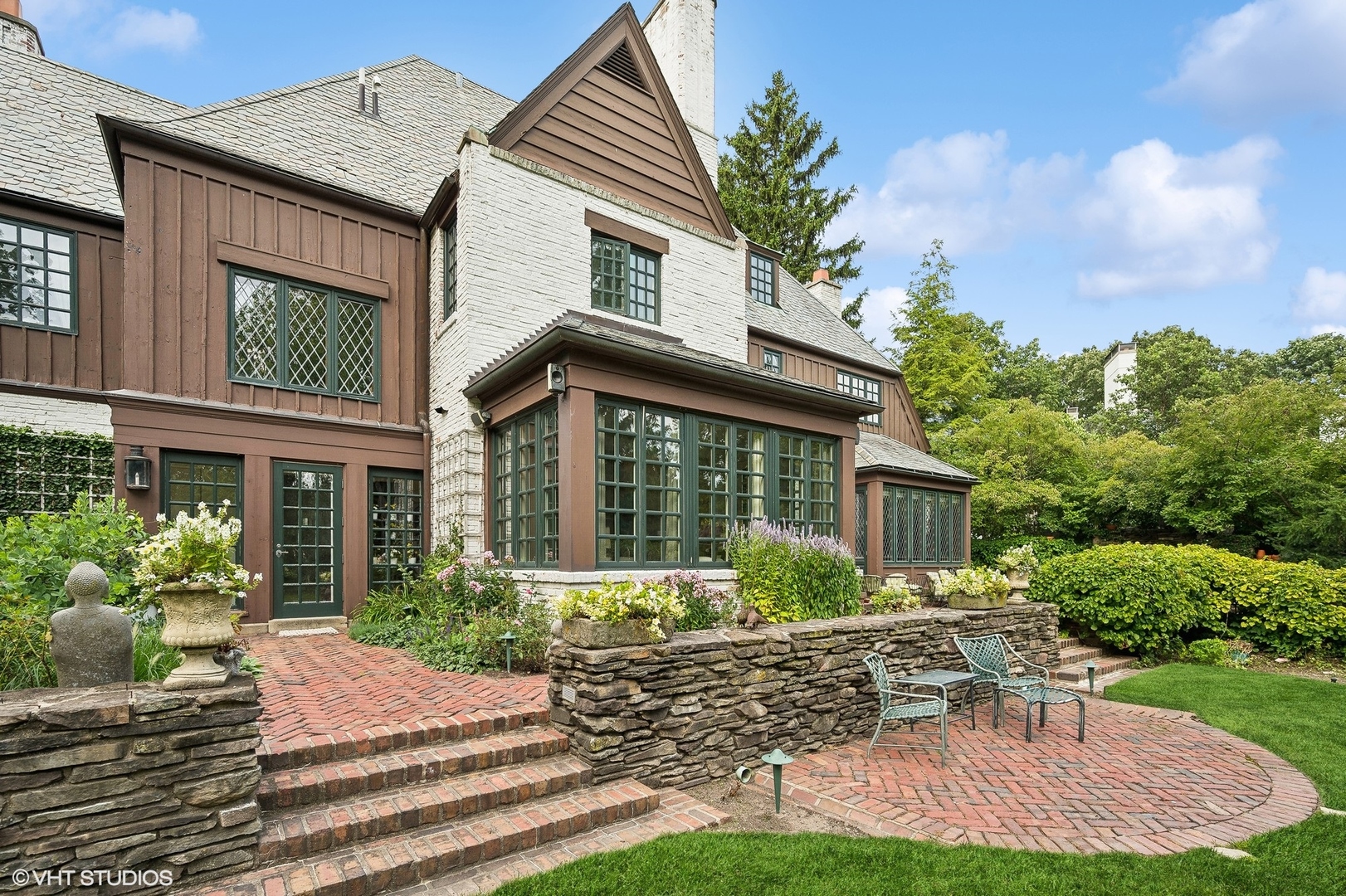 36 Indian Hill Road Winnetka, IL 60093 - Photo 42 of 51 a front view of house with yard and green space