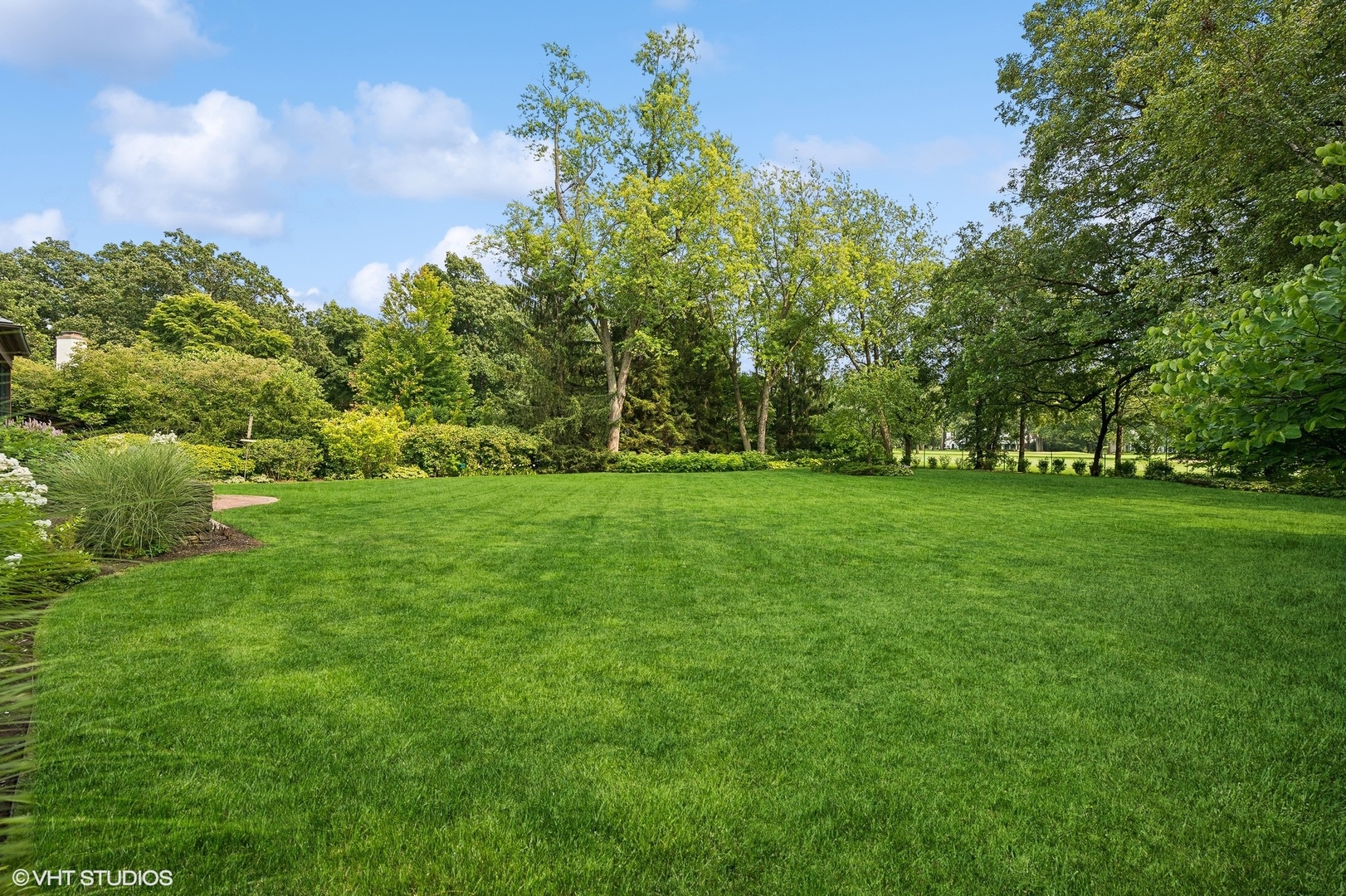36 Indian Hill Road Winnetka, IL 60093 - Photo 45 of 51 a view of green field with trees in the background