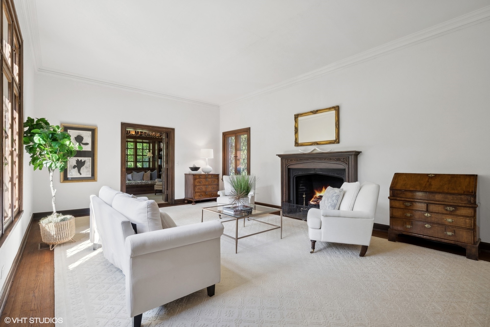 36 Indian Hill Road Winnetka, IL 60093 - Photo 5 of 51 a living room with furniture and a fireplace