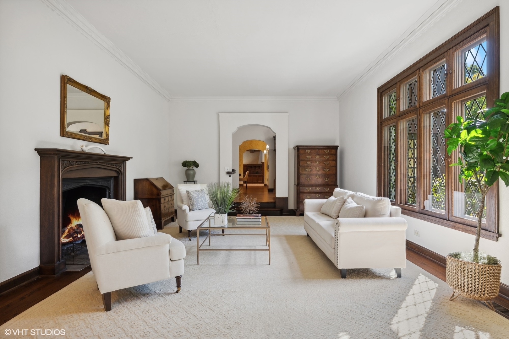36 Indian Hill Road Winnetka, IL 60093 - Photo 6 of 51 a living room with furniture and a fireplace