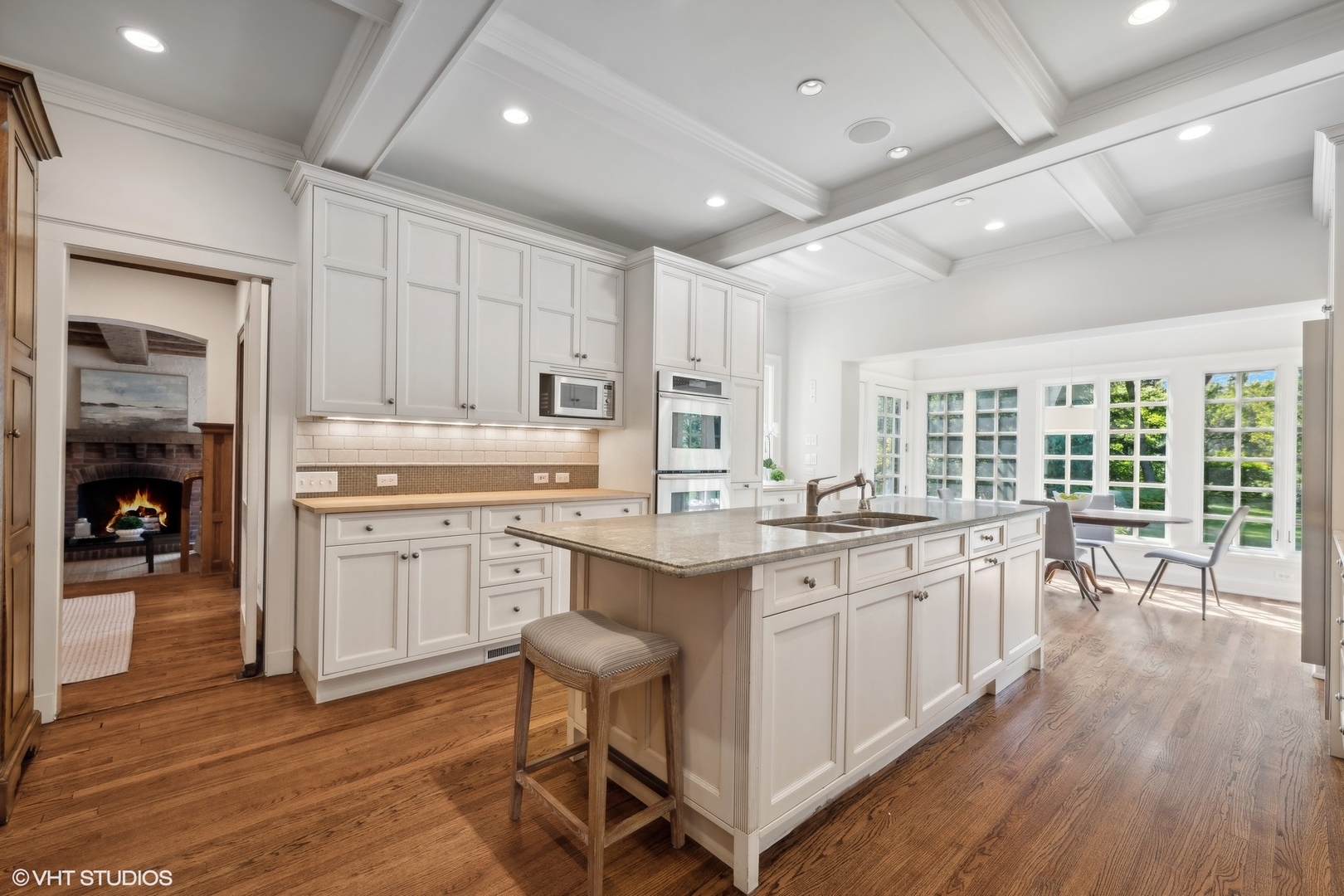 36 Indian Hill Road Winnetka, IL 60093 - Photo 10 of 51 a kitchen with a sink cabinets and wooden floor