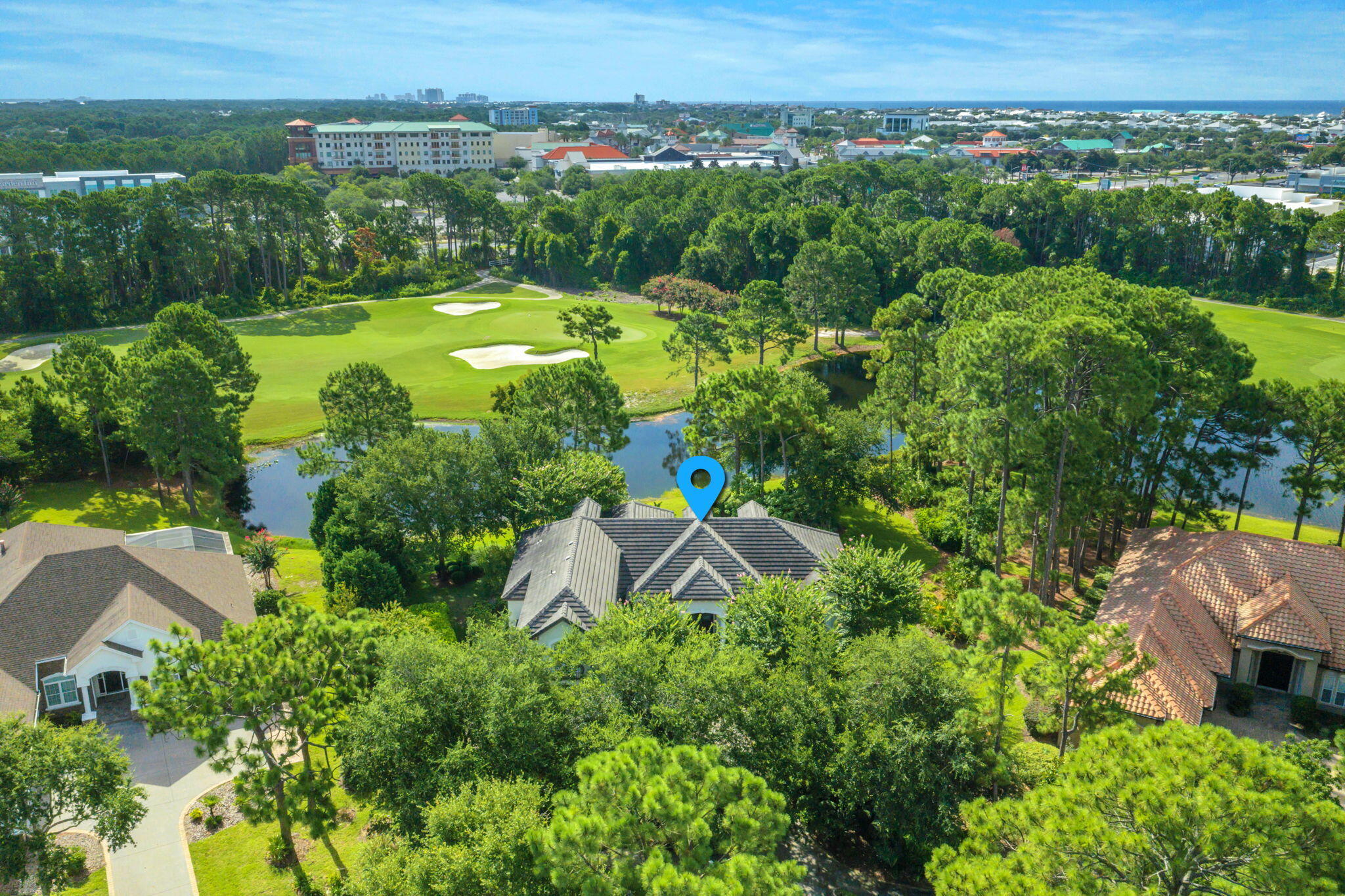 4470 Stonebridge Road Destin, FL 32541 - Photo 111 of 114 an aerial view of a house with yard and outdoor seating