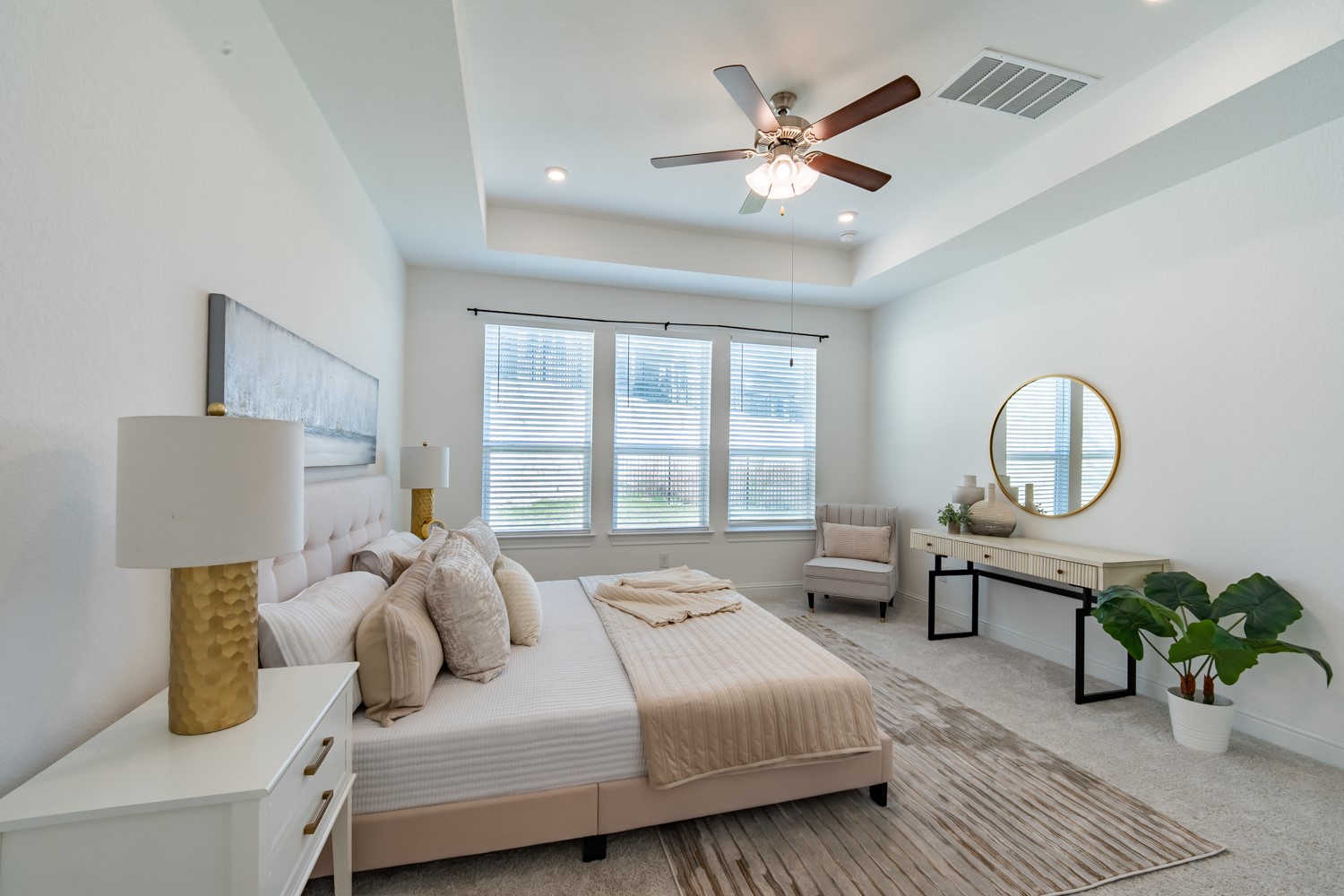 1040 Villa Rialto View Leander, TX 78641 - Photo 16 of 27 Bedroom featuring light colored carpet, a ceiling fan, a raised ceiling, and recessed lighting
