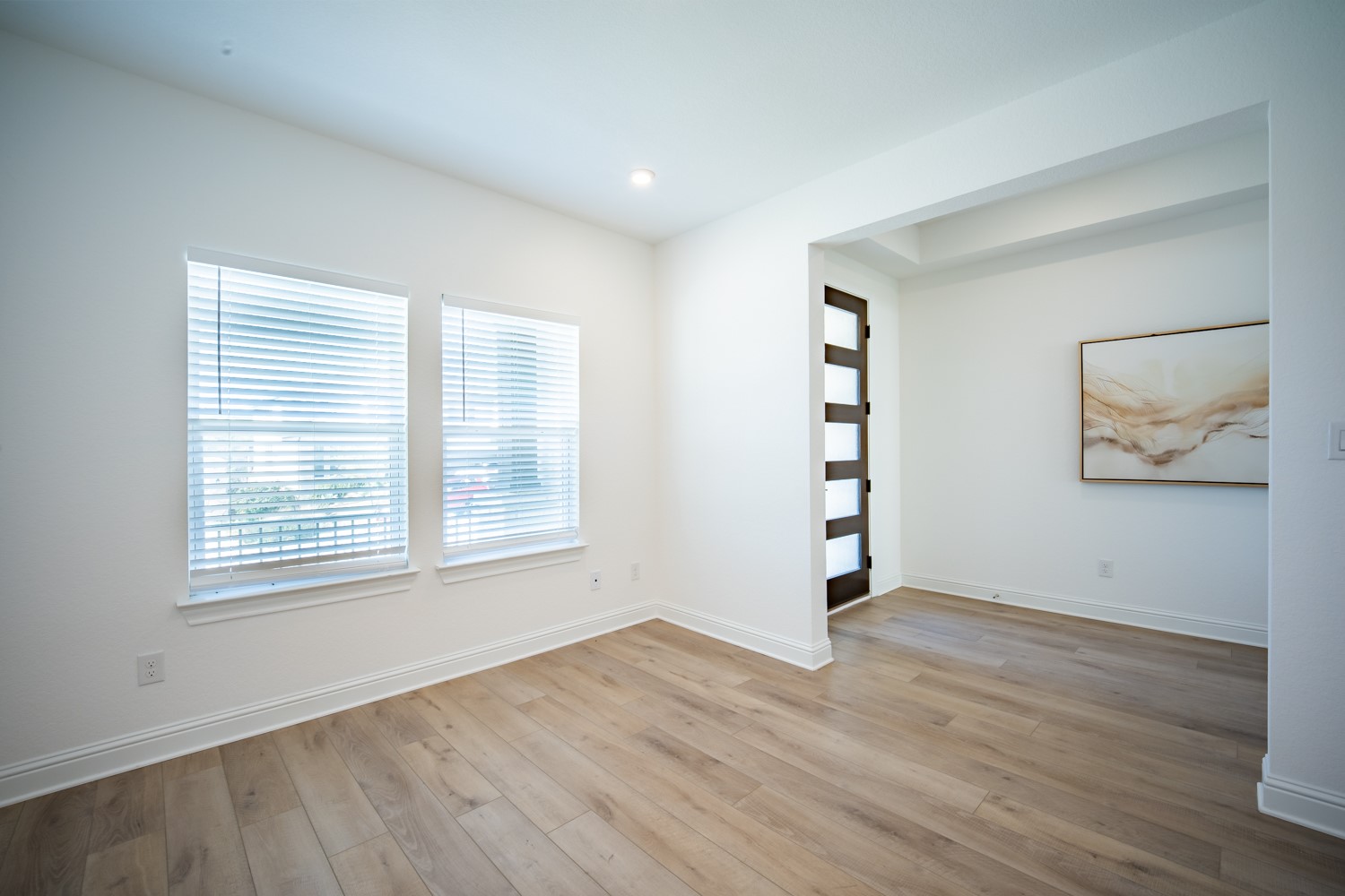 1040 Villa Rialto View Leander, TX 78641 - Photo 18 of 27 Unfurnished room featuring light wood finished floors and recessed lighting