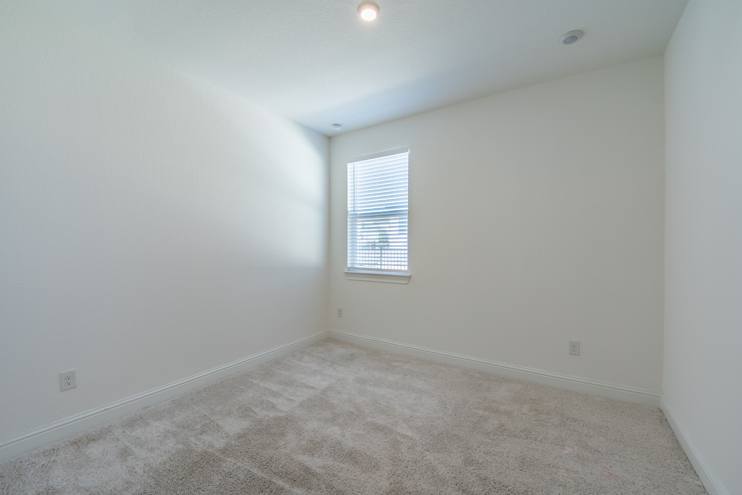 1040 Villa Rialto View Leander, TX 78641 - Photo 24 of 27 Spare room with light carpet and baseboards