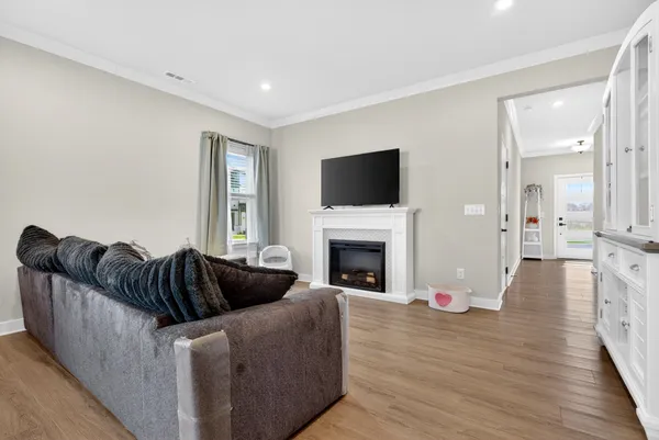 a kitchen with stainless steel appliances granite countertop a sink a stove and a microwave
